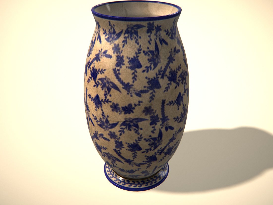 A blue and white patterned ceramic vase on a cream background.